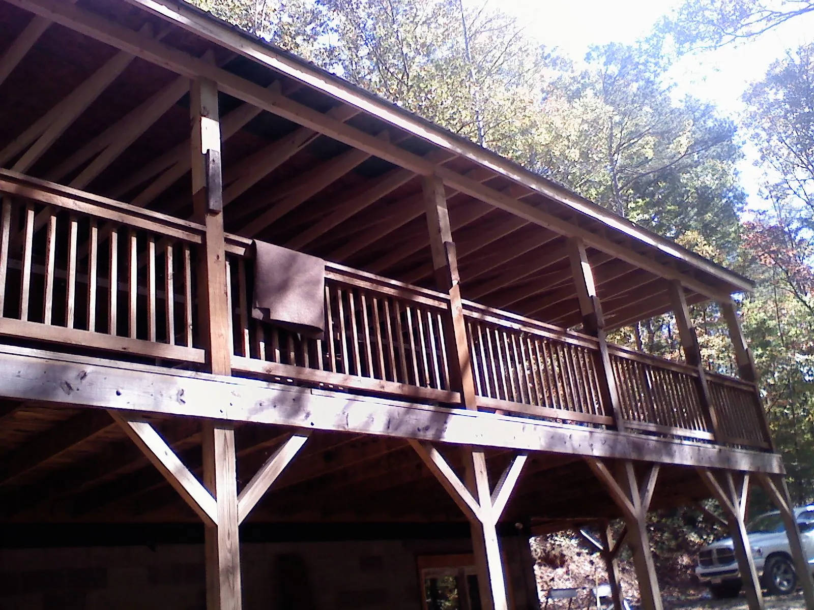 Timber framing under a new elevated porch and deck — Roof Leak Repair in Rockport by Roofing Brothers
